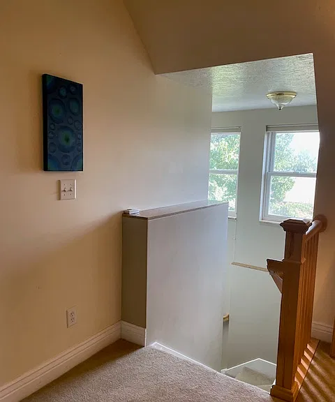 Top of stairs looking down. Plenty of light.