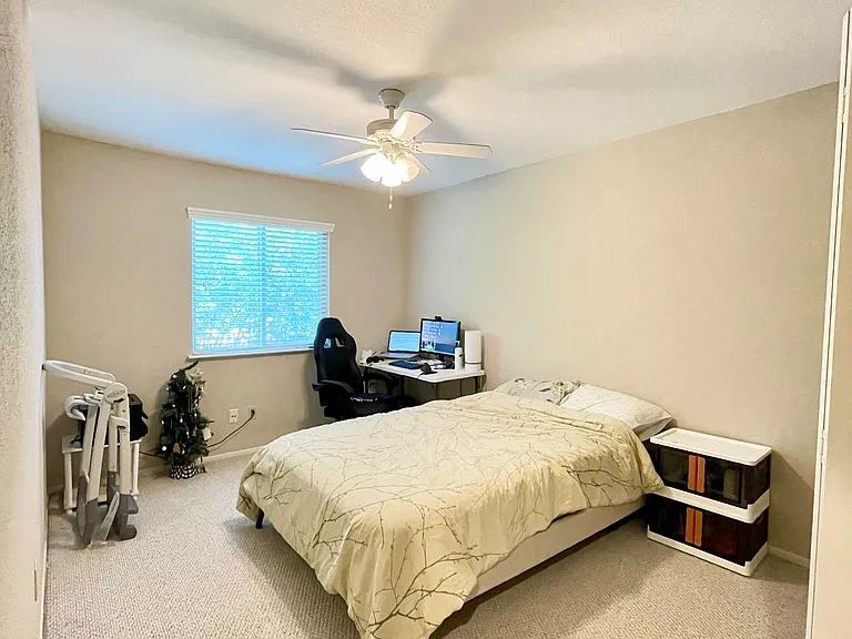 Bedroom #2, fits a full/queen size bed, with table and desk