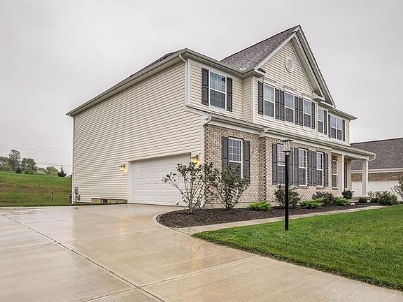 Side load garage for an upscale feel.