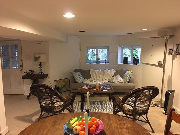 From kitchen island towards apt entrance and living/dining room