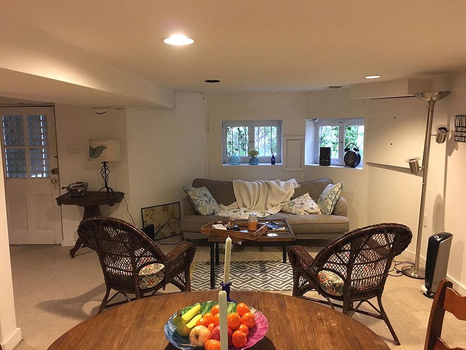 From kitchen island towards apt entrance and living/dining room