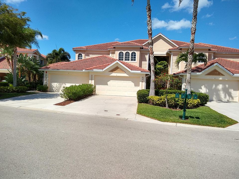 Driveway is straight ahead. Door entrance is middle left to upper Condo unit.