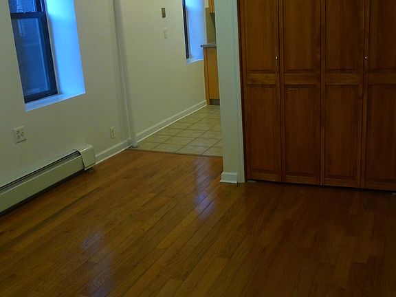 2nd image of 129 E 4th St Frnt 1