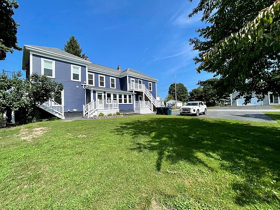 Front of house and parking lot.