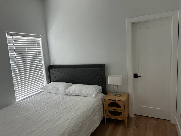 Main bedroom with attached full bathroom.