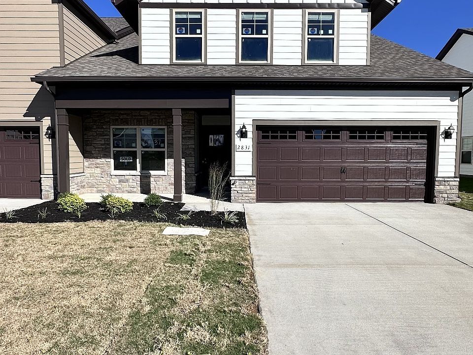 File photo NEW end unit 3 3, 2 car, 2 bedrms down 2 bath, 1 bedrm bath up, great rm kitchen, covere
