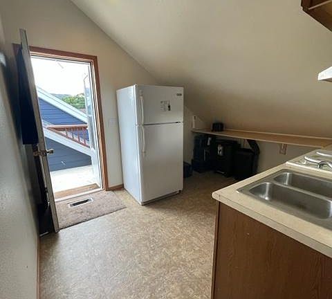 Kitchen as you walk into the apartment.