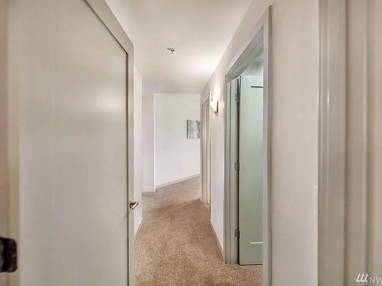 Entrance to Master bed room suite with walk in closet , bathroom and balcony