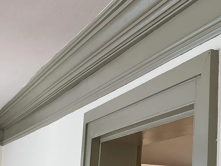 Livingroom crown molding and victorian art rail