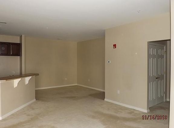 KITCHEN, LIVING ROOM AND DINING AREA