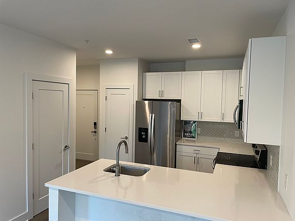 Spacious kitchen that is open to the main living area