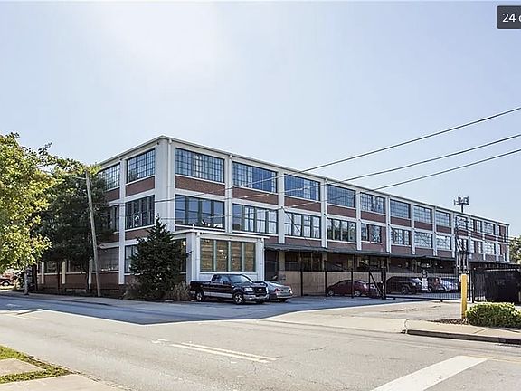 Condo Building with Gated Car Parking Entrance