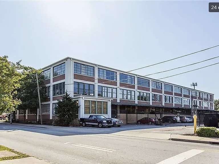 Condo Building with Gated Car Parking Entrance
