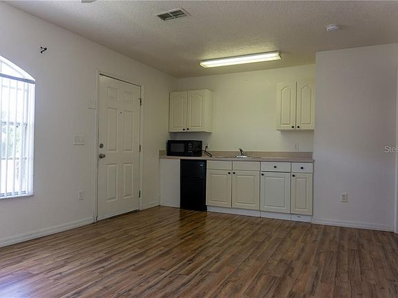 4th image of 1028 Washington Palm Loop