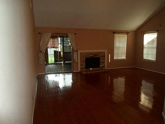 Large living room with beautiful wood flooring