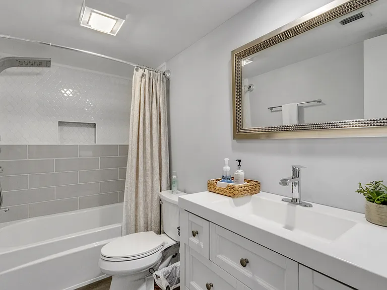Renovated guest bath with elevated shower experience