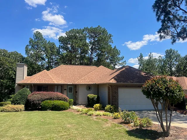 Low maintenance exterior includes lawn service