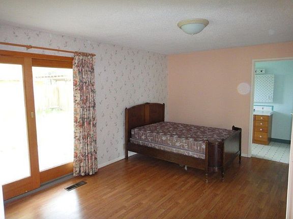 Master Bedroom with Slider to Patio.