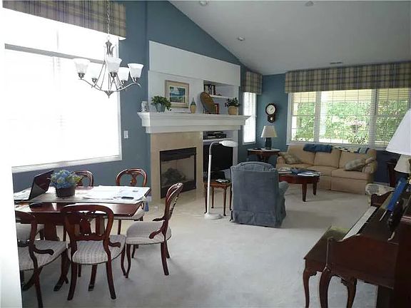 Living room and dining area(photos from listing in 2013, many improvements since)