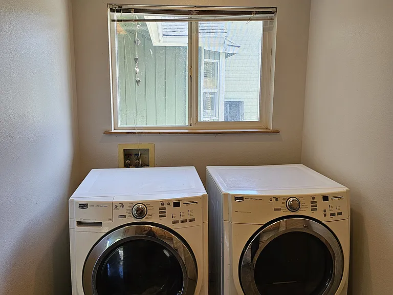 Laundry room/mud room/garage access located off of main living room.