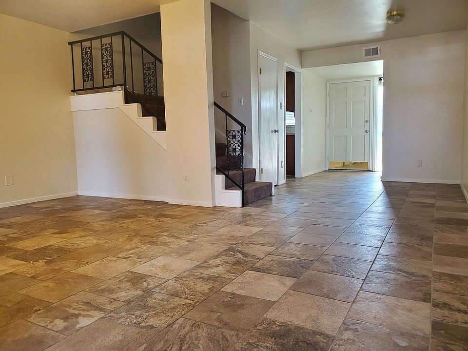 LIving room, half bath and kitchen downstairs