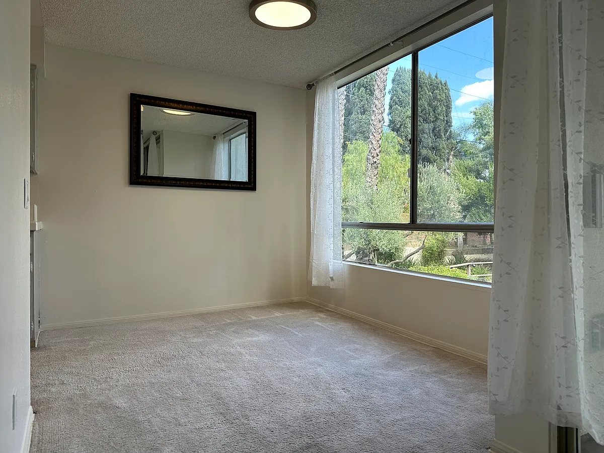 Building Photo - 1340 S Beverly Glen Blvd #202