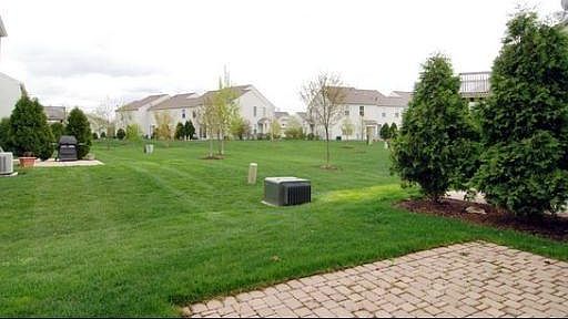 Patio facing backyard