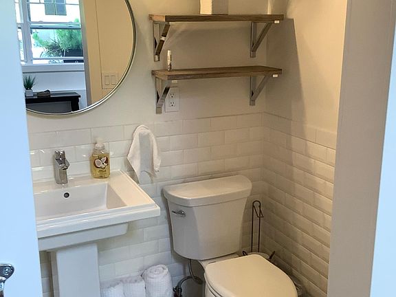 Bathroom, stand up tiled shower to left