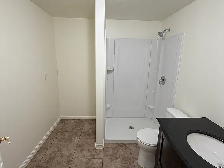 Bathroom near kitchen/dining area