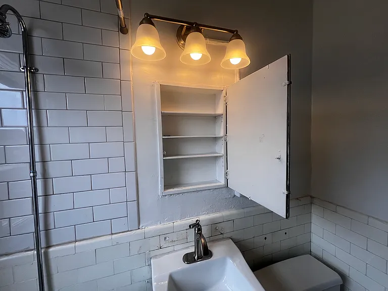 Updated lighting and inside of medicine cabinet.