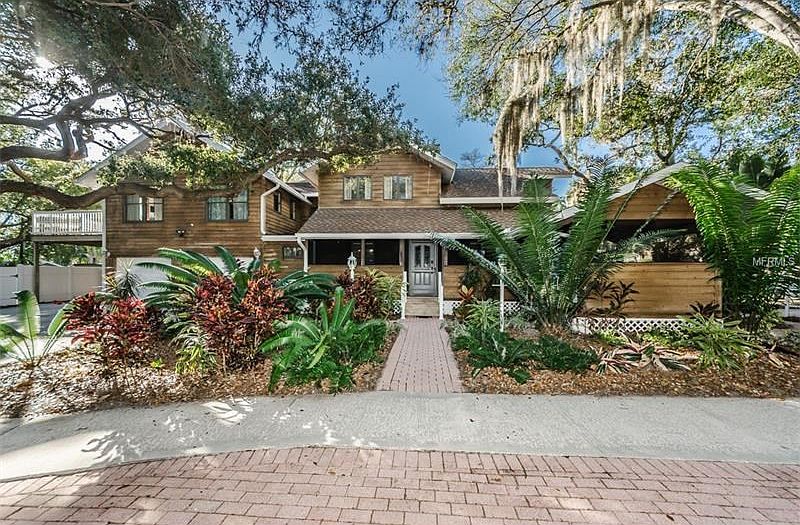 Beautiful Front Exterior with brick pathways
