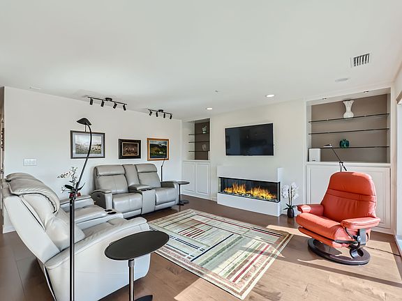 Hardwood floors and custom fireplace