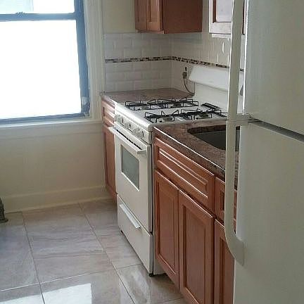2nd image of 8717 Myrtle Ave #1