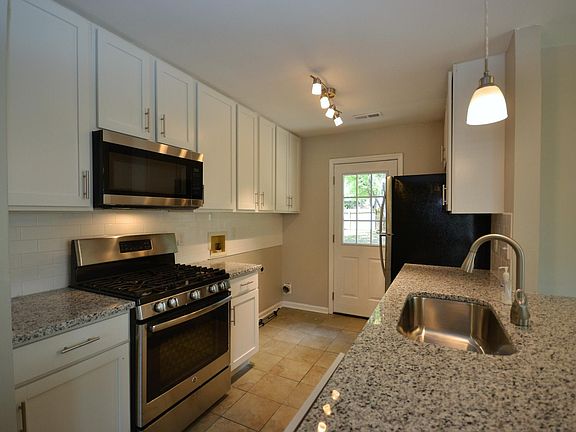 Kitchen has all new stainless steel appliances including gas