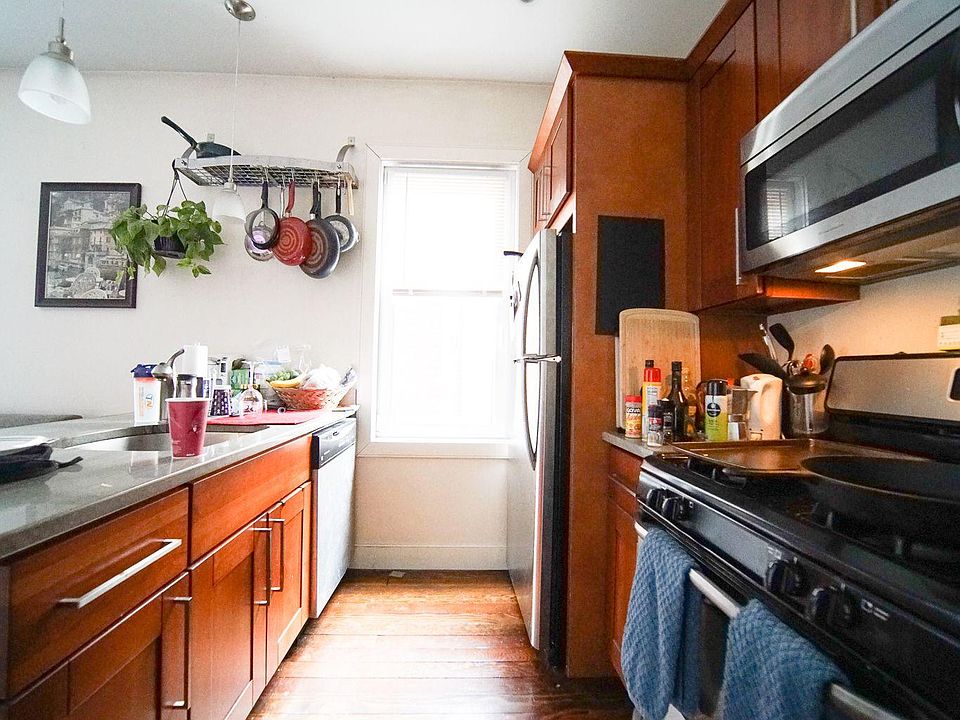 Open Kitchen w/SS appliances and granite counters