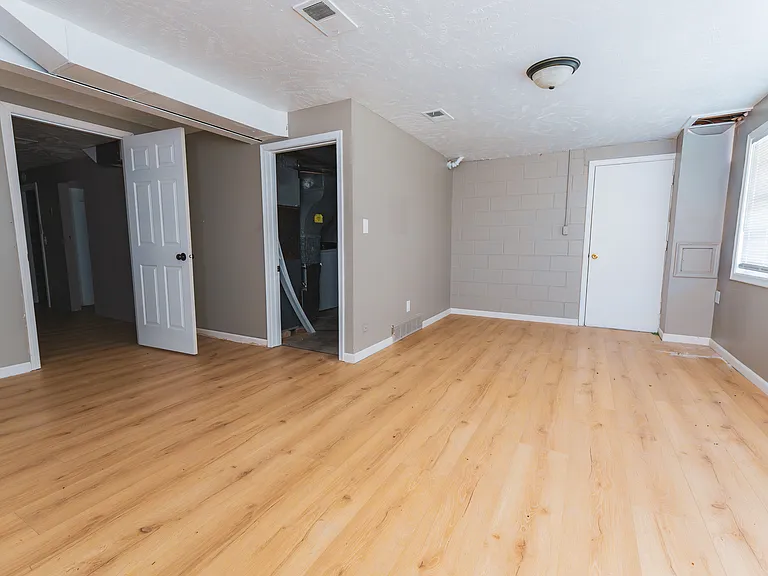 Downstairs Living Area/Office Space, with private garage entry point and private access door