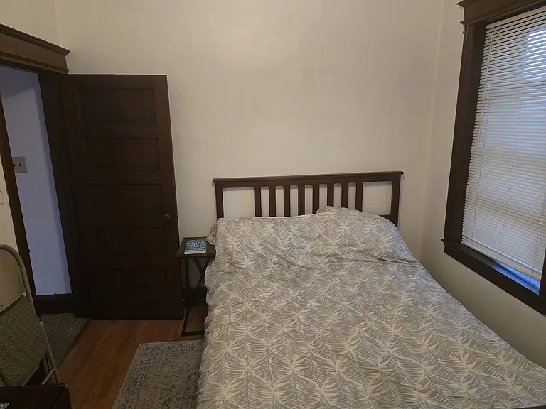 Bedroom 2 from foot of bed looking towards Door/Foyer