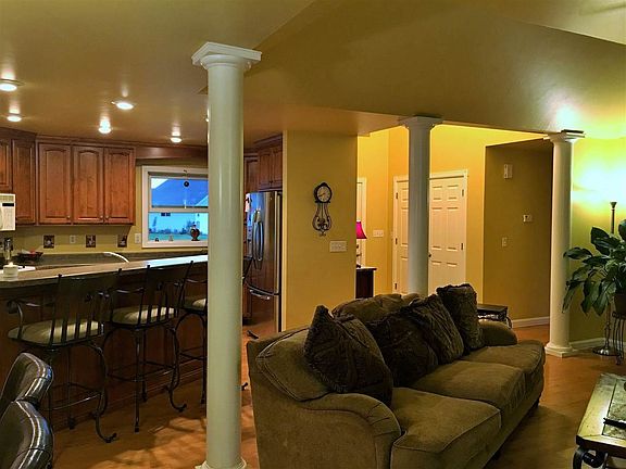 open concept kitchen dine and living room