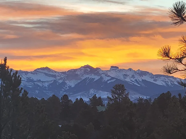 Courthouse mountain and Chimney Rock at sunrise from deck
