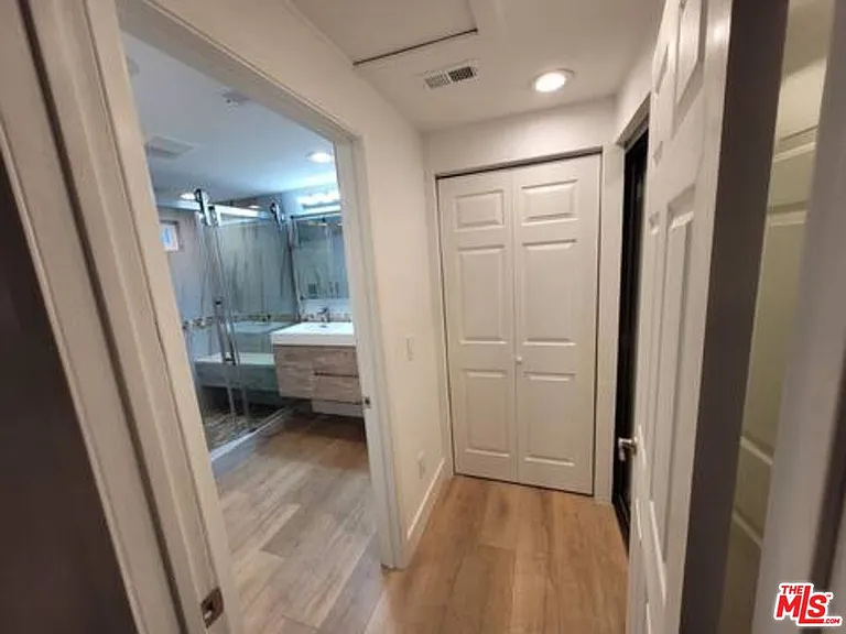 Primary Closet and Primary Bathroom