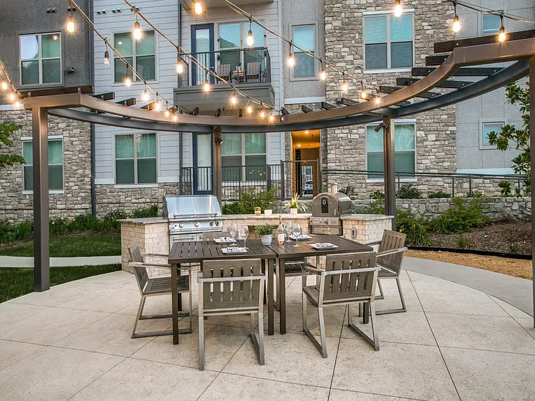 Outdoor grills with dining patio