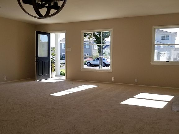 Entry and Living Room with Fireplace.