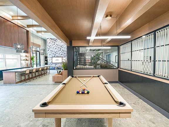 Enjoy stylish leisure time in the inviting game lounge, complete with contemporary design and comfortable seating.