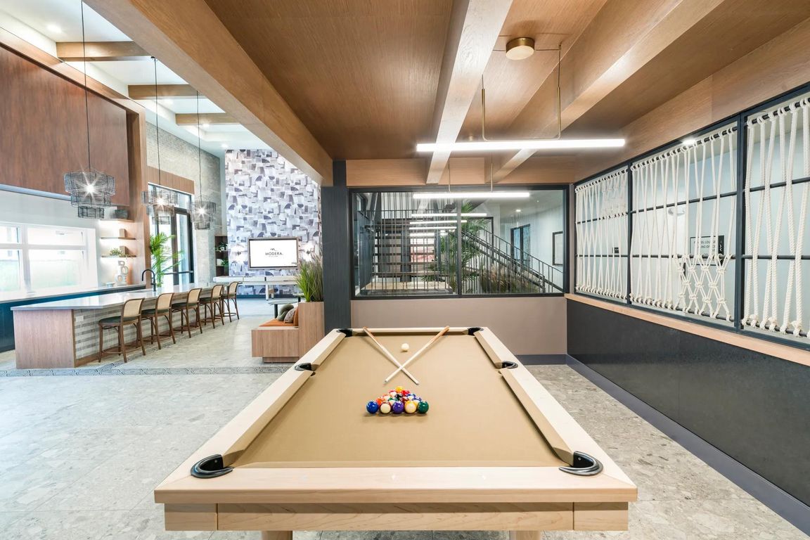 Enjoy stylish leisure time in the inviting game lounge, complete with contemporary design and comfortable seating.