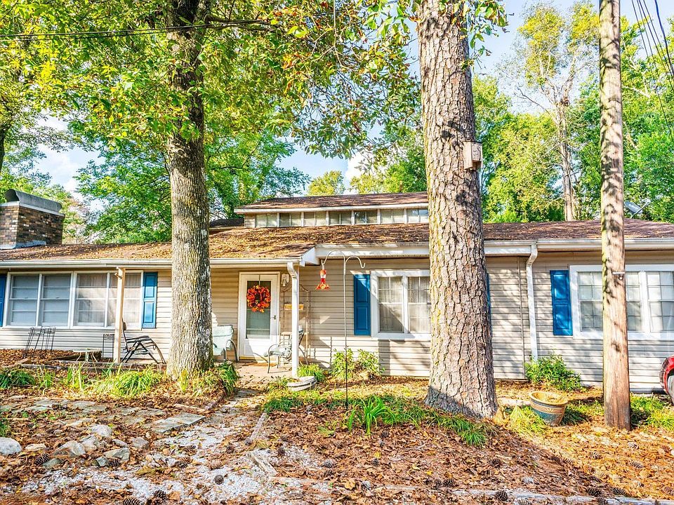 This apartment is located on the top floor of this house.