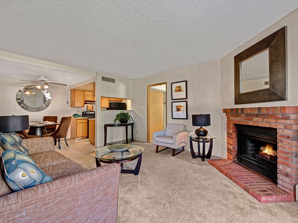 Grand View Furnished Living Room with Fireplace