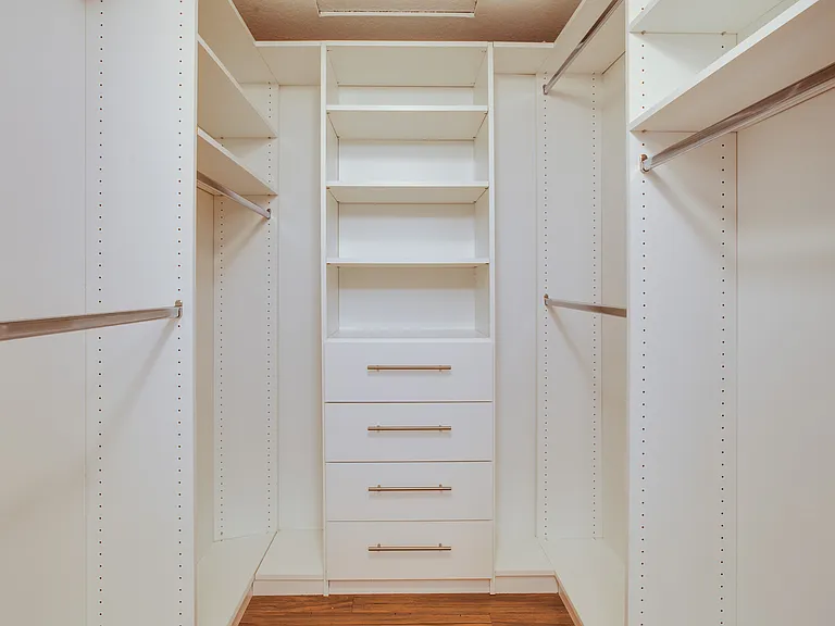 Walk-in closets offer great hanging space with extra organization component