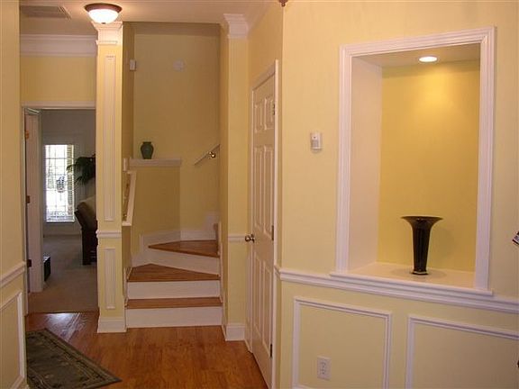 Lower Level has Garage and Guestroom/ Media Room with Full Bath