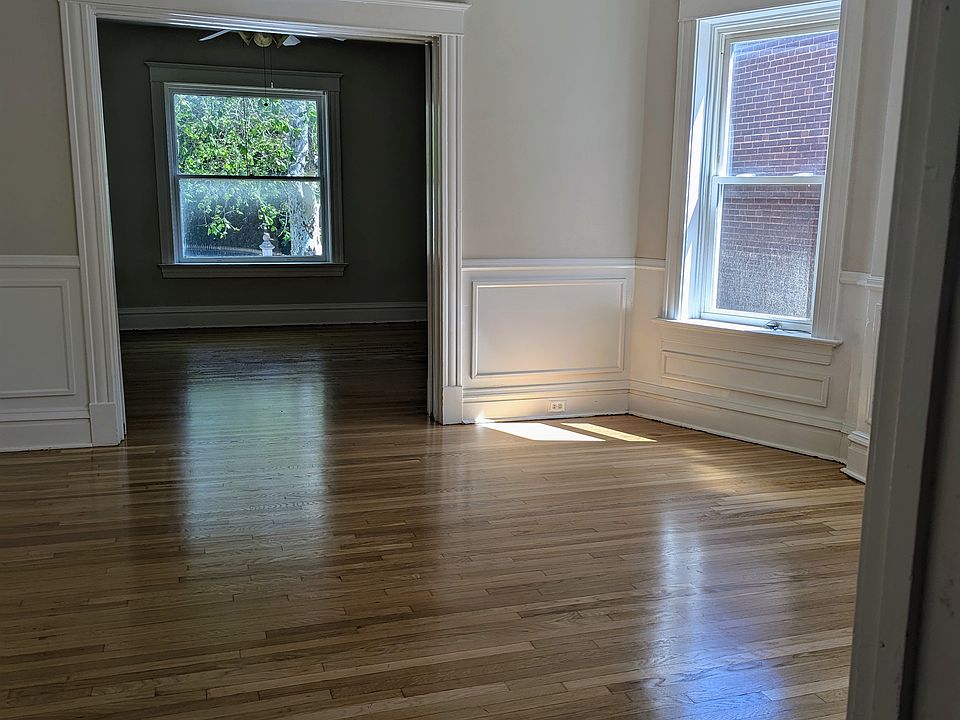 In hallway in front of master bedroom door, looking to living rooms. (not pictured is hallway closet to right)