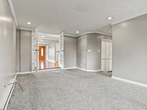 secondary living space with gas fireplace